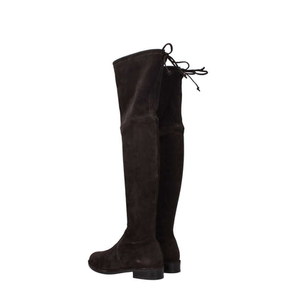 Stuart Weitzman Brown Leather Over The Knee suede boots with round toe and self-tie closure viewed from the side.