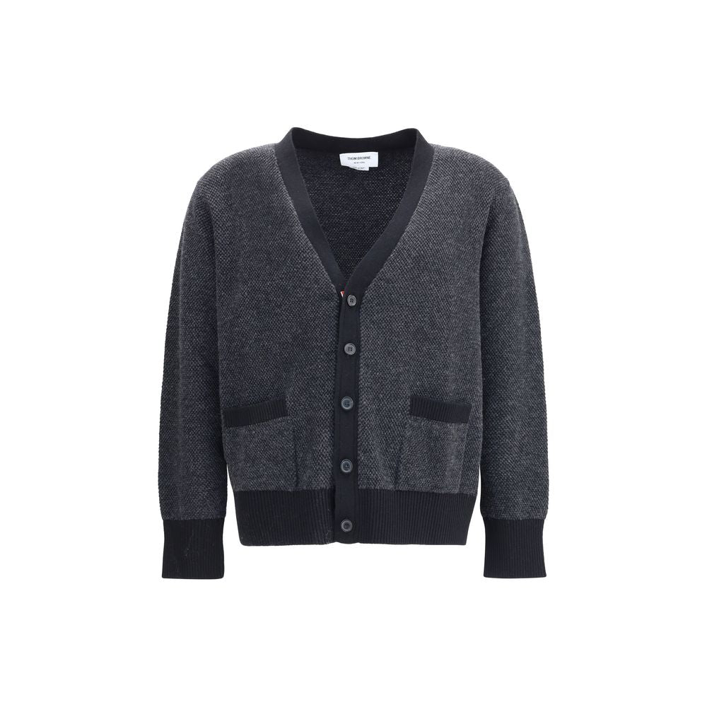 Thom Browne Black Fleece Wool Cardigan with V-neckline and front button closure, ideal for sophisticated style in AW25 collection.