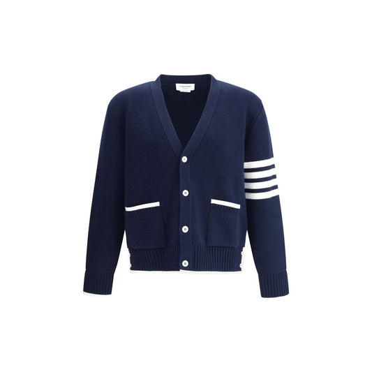 Thom Browne Blue Merino Wool Cardigan with V-neck, button closure, and signature sleeve bands.