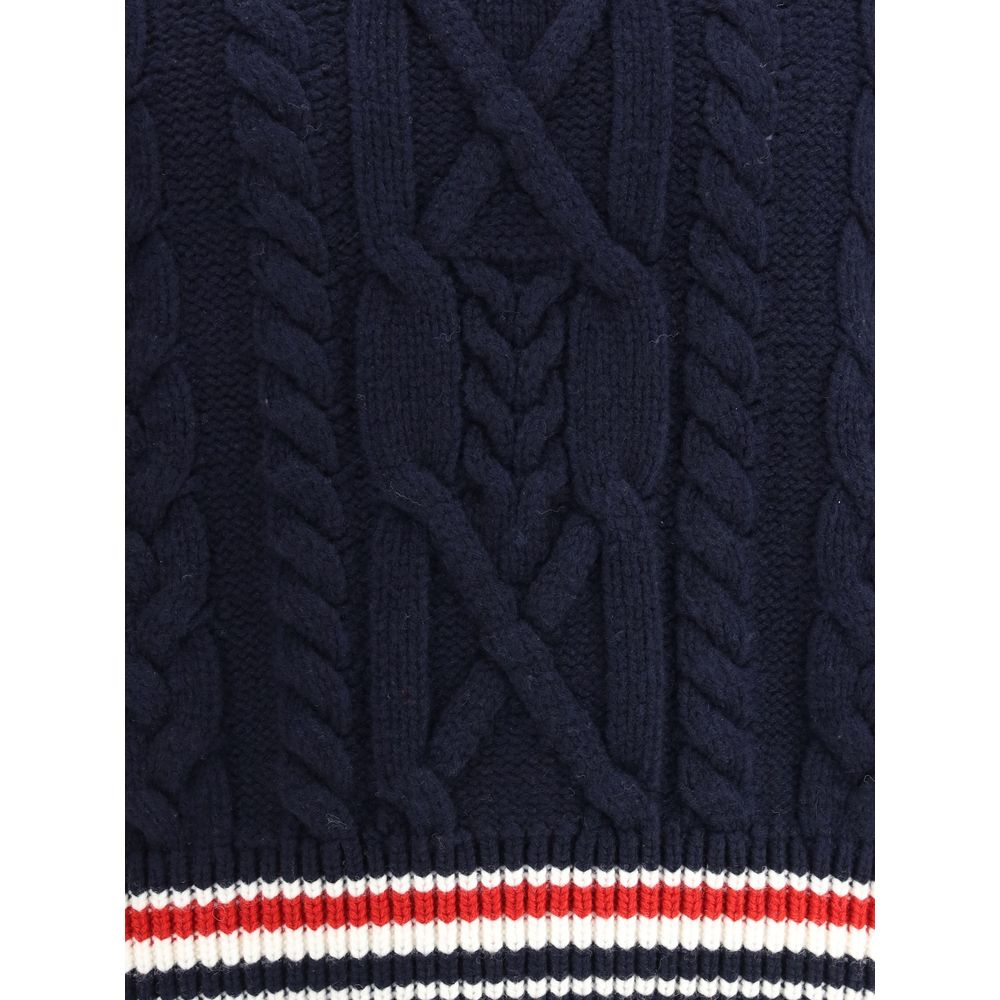 Thom Browne Cable knit Sweater with tricolor hem details showcasing elegant and contemporary style.