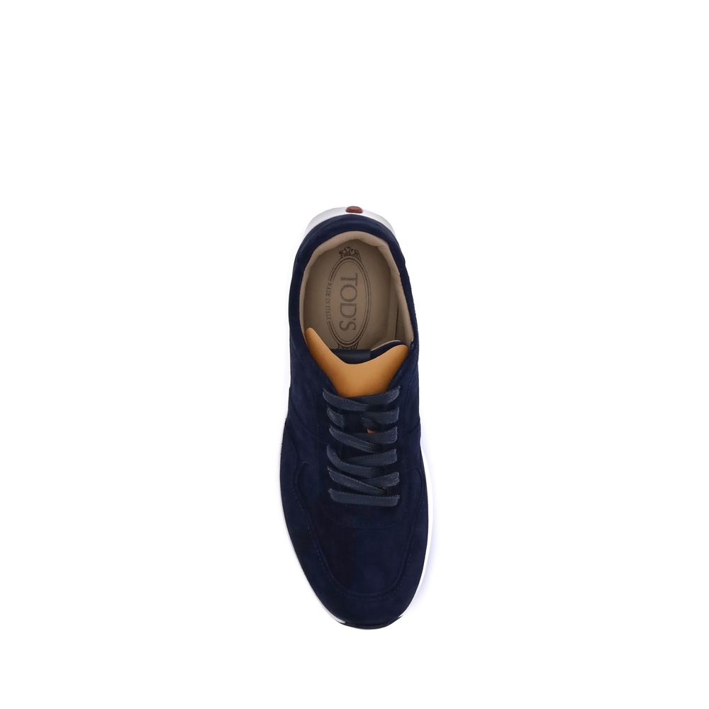 Top view of Tod's Blue Calf Leather Bos Taurus Low Top Sneakers showcasing suede design and logo on tongue.