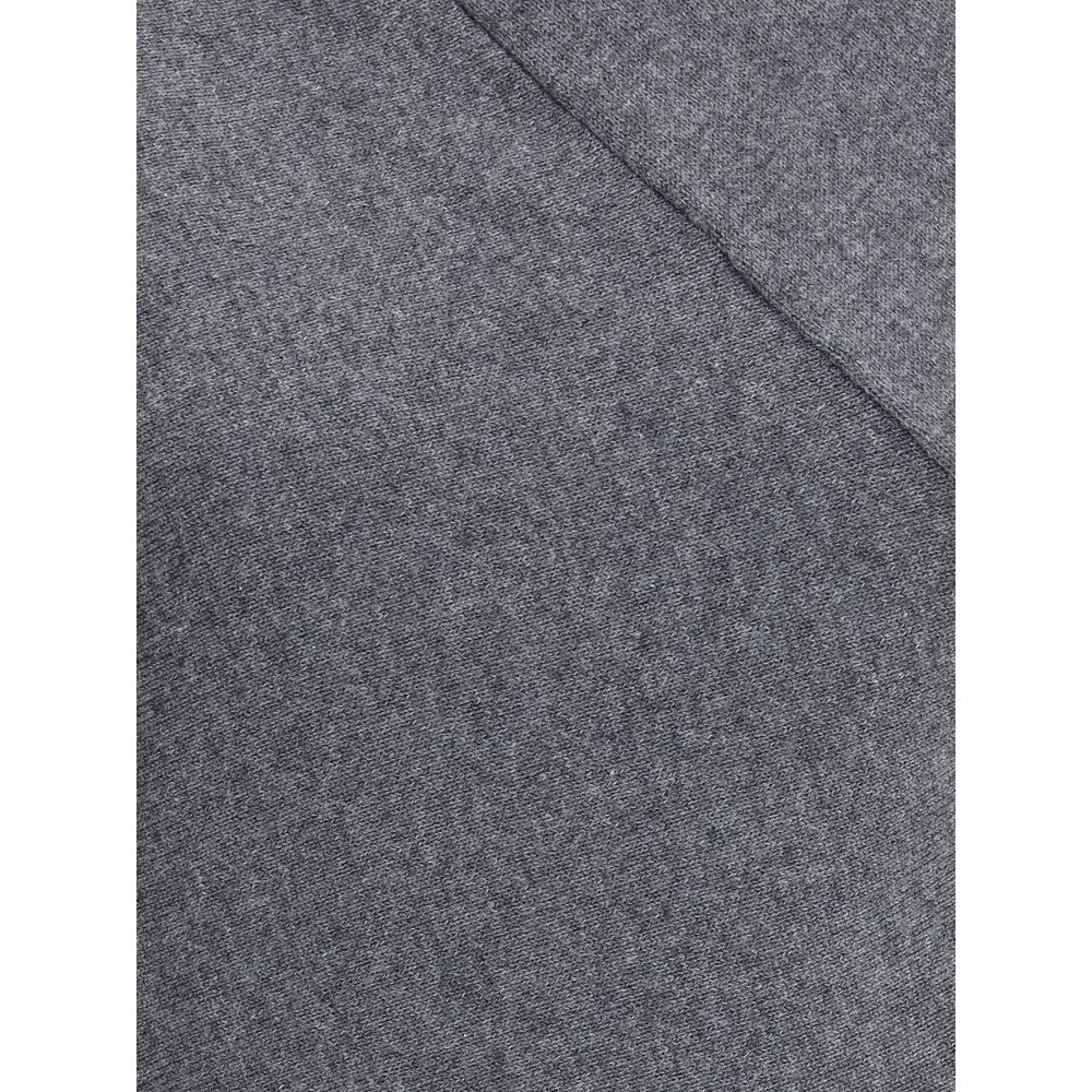 Close-up of Tom Ford Gray Cashmere Turtleneck fabric texture detailing elegance and quality.