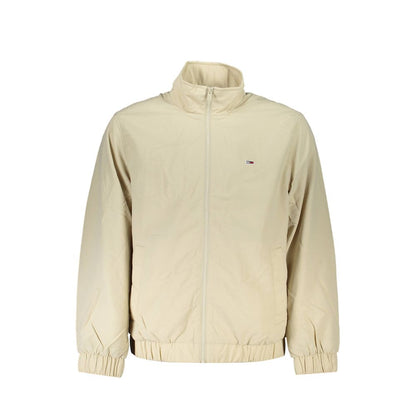 Tommy Hilfiger Beige Polyamide Men Jacket with elastic waist and cuffs. Eco-friendly recycled nylon with trio of pockets for functionality.
