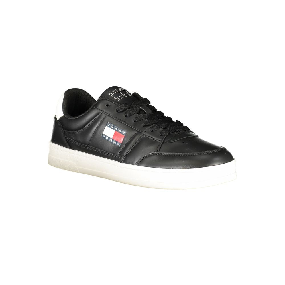 Tommy Hilfiger Black Leather Men Sneaker with contrasting white details and logo, featuring removable insole for comfort and style.