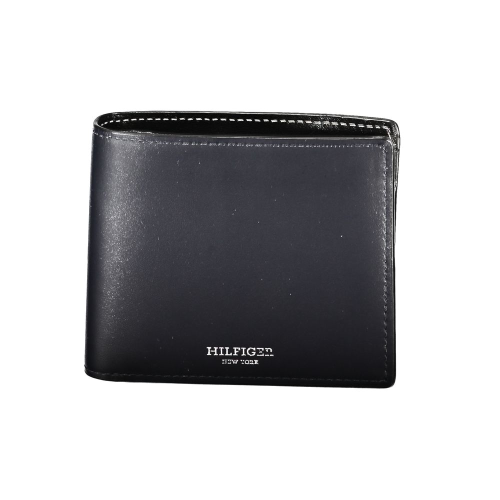 Tommy Hilfiger Blue Leather Wallet with two compartments, coin purse, card holder, contrast details, and logo highlighting.