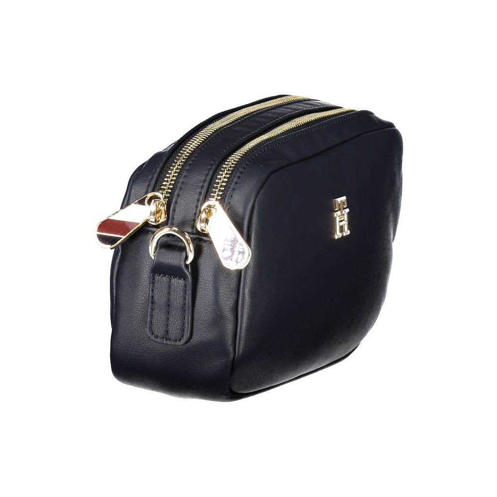 Tommy Hilfiger Blue Polyester Women Handbag with dual zippers, adjustable strap, and iconic logo detailing for stylish organization.