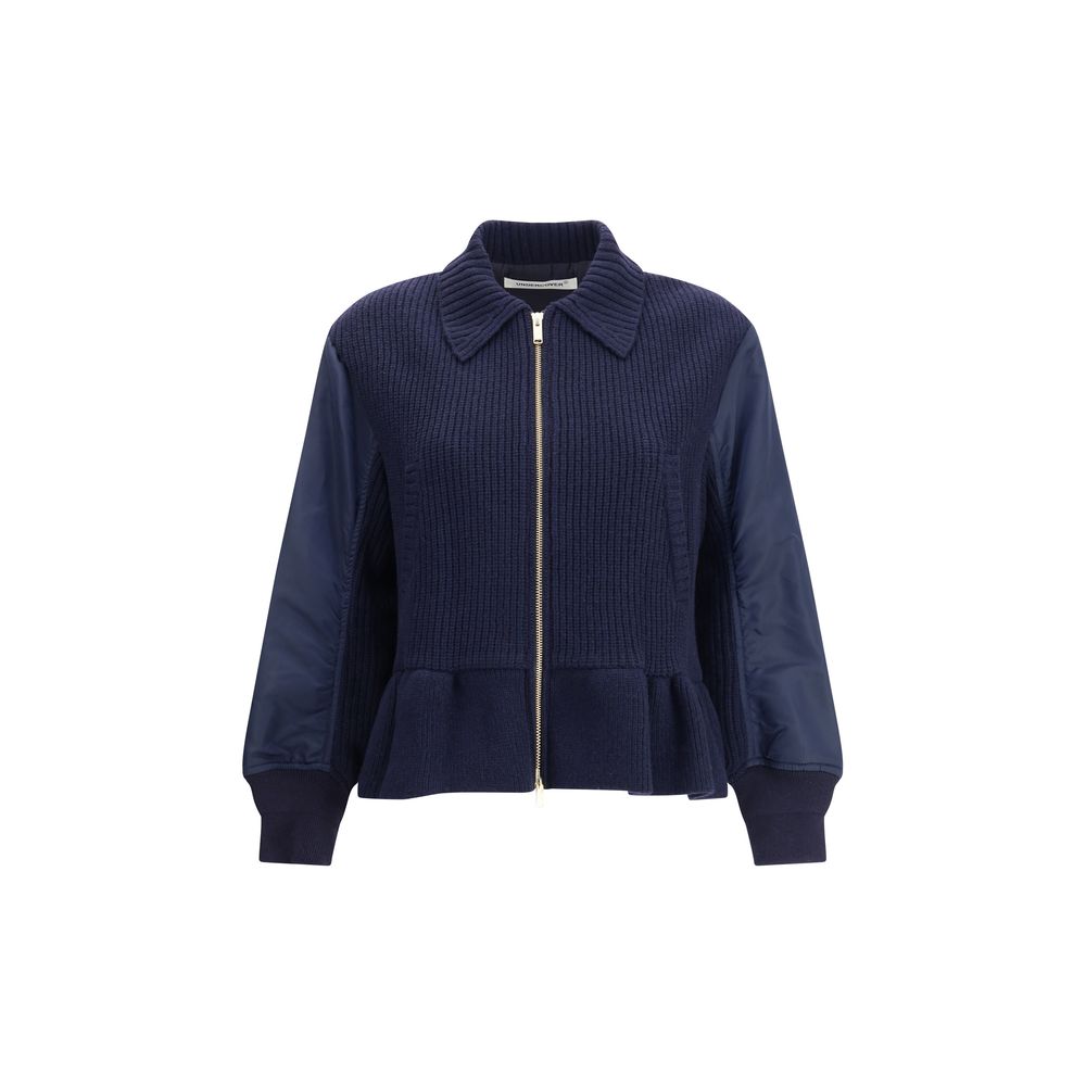 Undercover Blue Wool Bomber with classic collar, ribbed cuffs, flared hem, and wool inserts showcasing modern streetwear style.