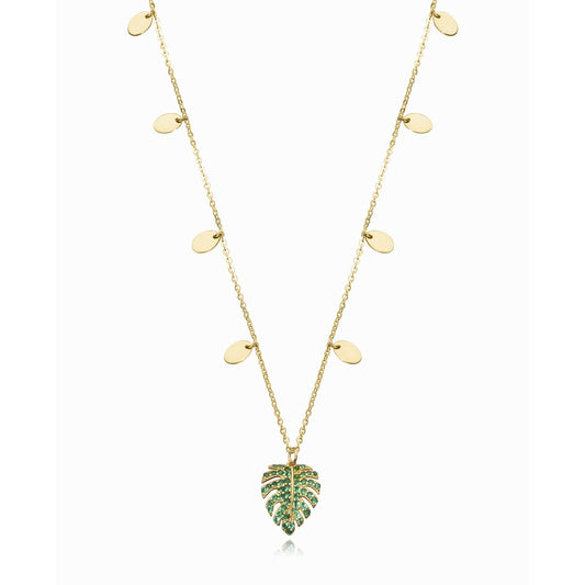 Gold leaf pendant necklace with green accents on a chain featuring round charms, elegant jewelry piece.
