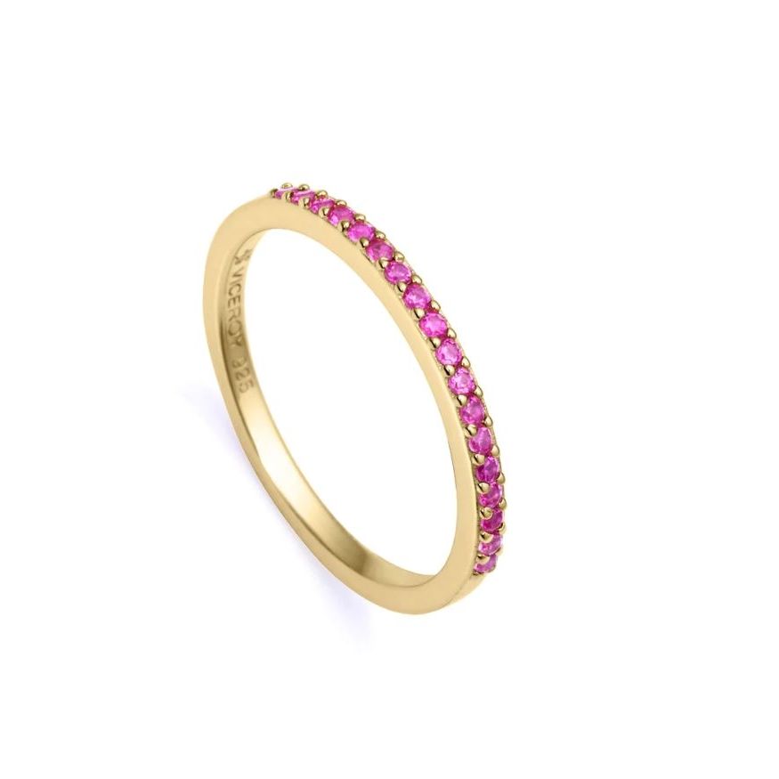 Elegant gold band ring with pink gemstones, showcasing classic design and luxury.