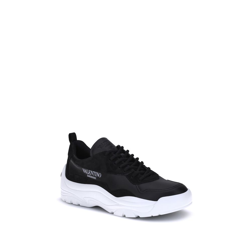 Valentino Garavani Black Calf Leather Bos Taurus Chunky Sneakers with printed logo and VLogo Signature, preformed sole, and lace-up design.