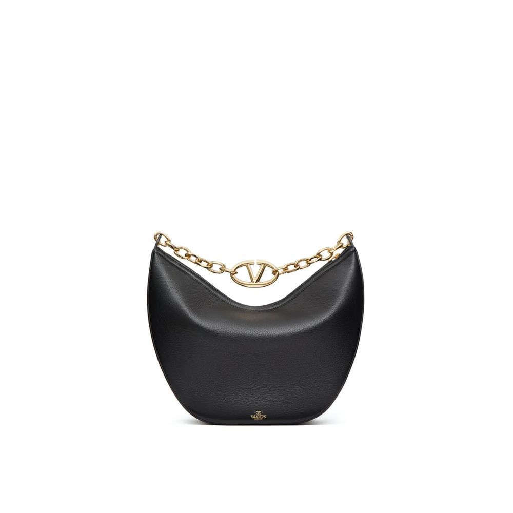 Valentino Garavani Black Calfskin Shoulder Bag with gold-tone Vlogo, leather texture, chain handle, and removable strap. Made in Italy.