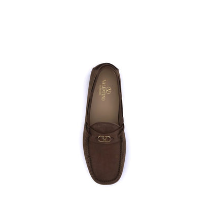 Top view of Valentino Garavani Brown Rubber Slip-On Loafers with VLogo plaque, showcasing the suede leather and distinctive design.