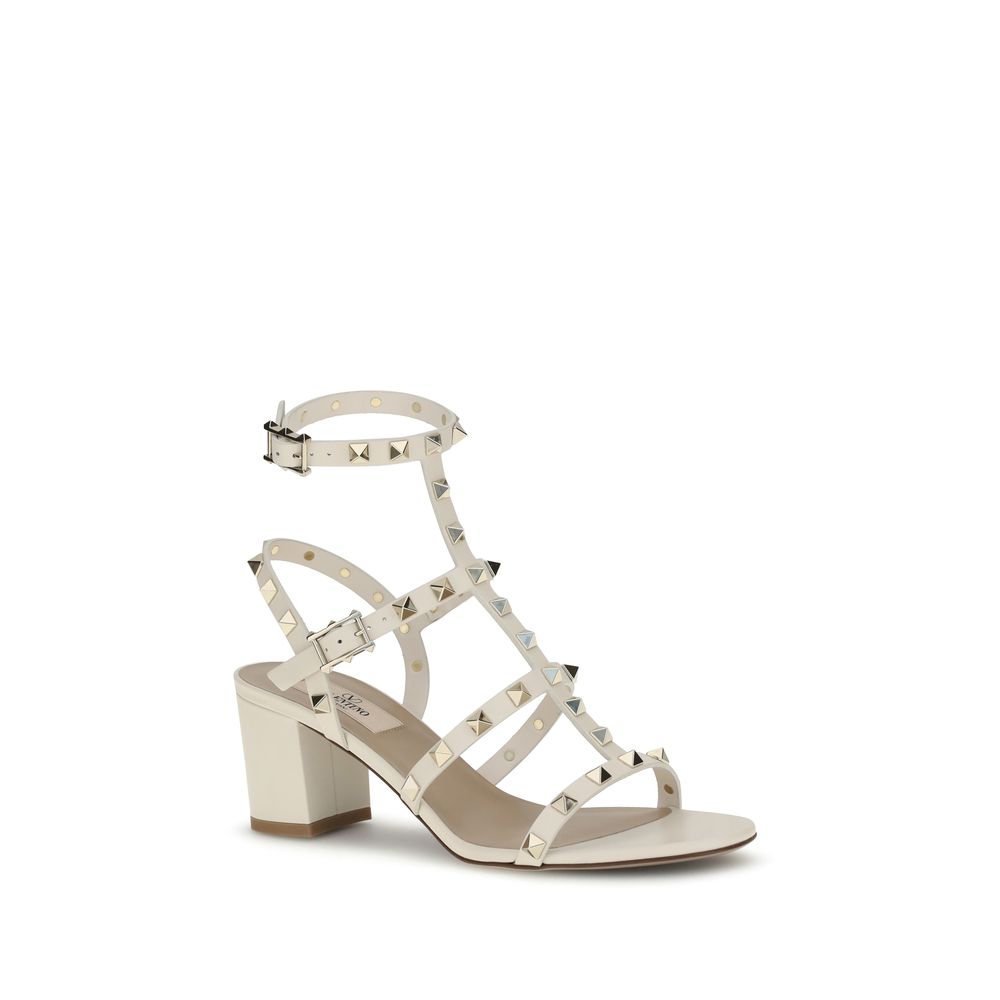 Valentino Garavani Cream Calf Leather Bos Taurus Sandals with Rockstud studs and chunky heel.
