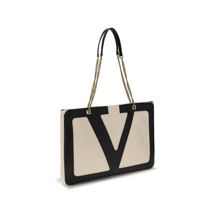 Valentino Garavani Cream Lamb Ovis Aries Aries Shoulder Bag with maxi VLogo and sliding chain on white background.