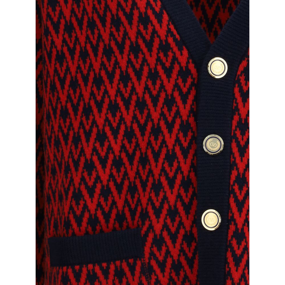 Valentino Multicolor Fleece Wool Cardigan with embossed buttons and V logo pattern, featuring ribbed hems and front welt pockets.