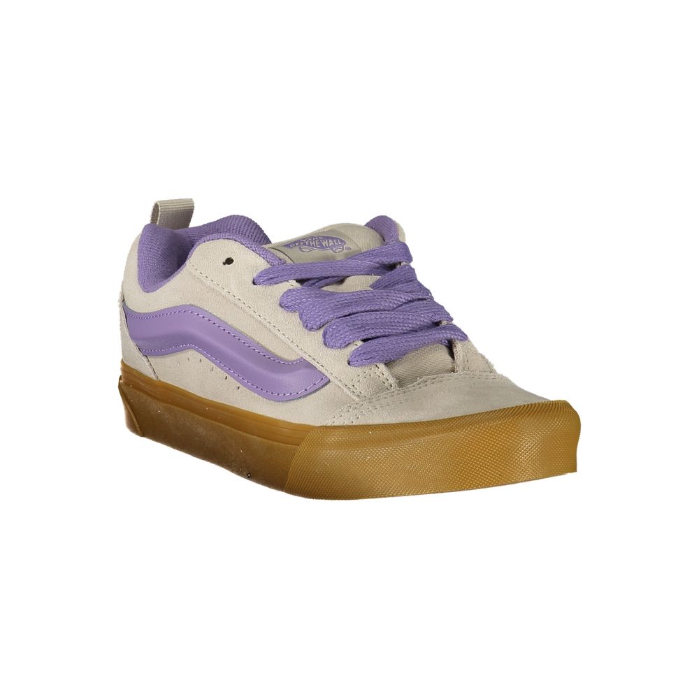 Vans Gray Leather Women Sneaker with Wisteria accents and iconic logo on side, emphasizing comfort and style for casual outfits.
