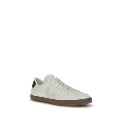 White sneaker with black heel and Veja logo, Veja Black Leather Sneakers, featuring round toe and lace-up closure.