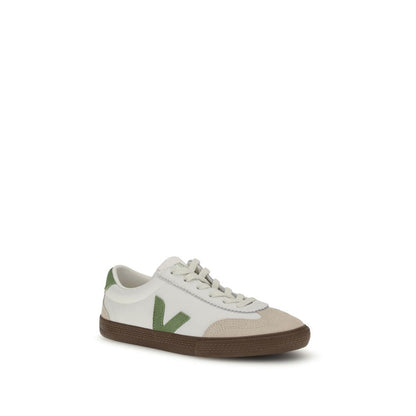 Veja White Leather Low Top Sneakers with green logo, rounded toe, lace-up closure, inspired by 1970s volleyball shoes.