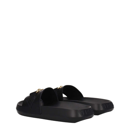 Versace Black Leather Slippers with gold detail, open toe, and rubber sole. Casual style with front detail and back logo.