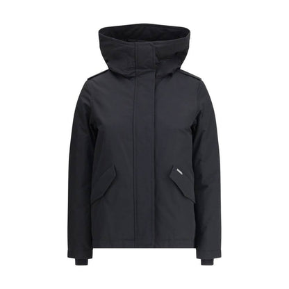 Woolrich Black Cotton Shell Jacket with hood and front pockets, ideal for warmth and style in colder seasons like AW25.