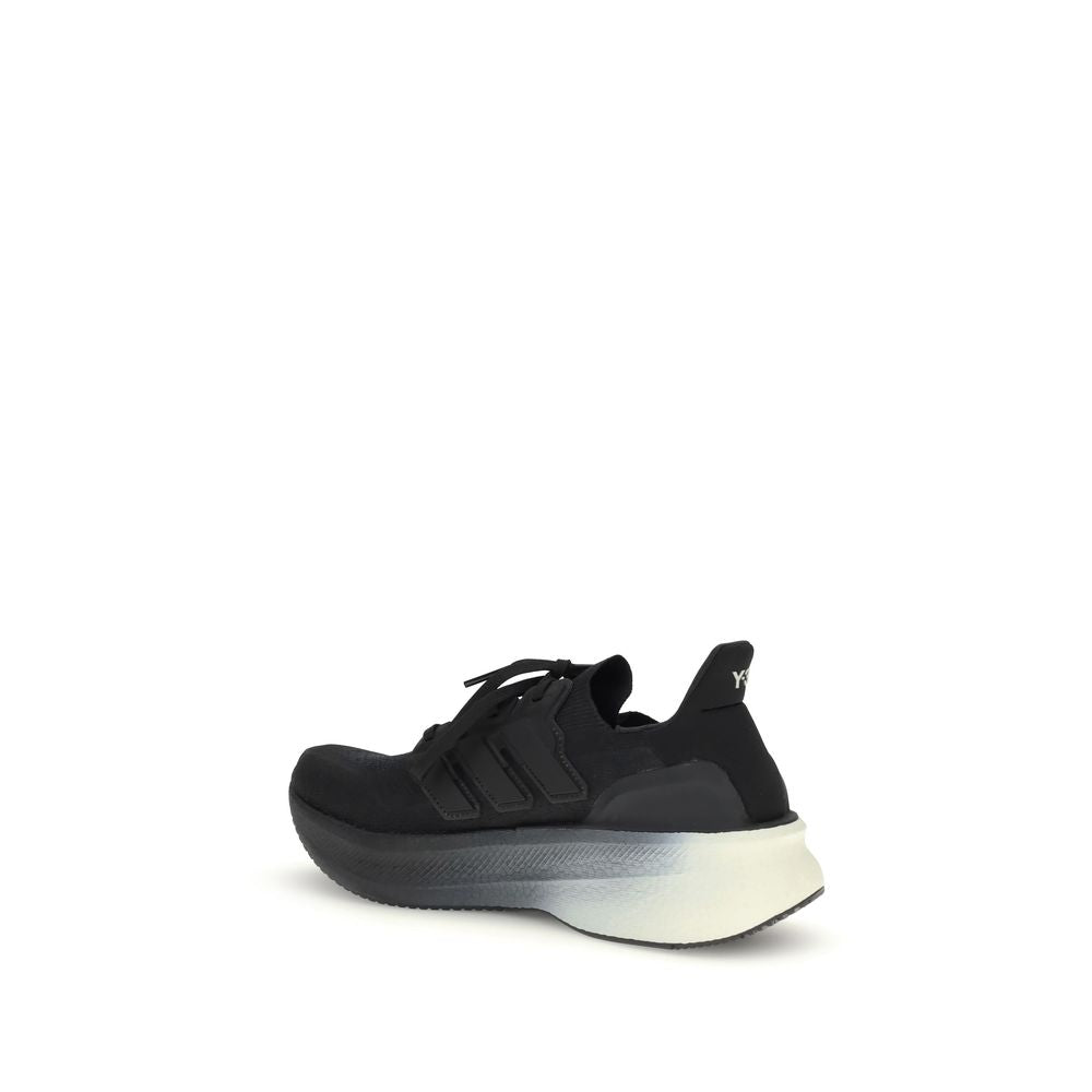 Y-3 Black Fabric Athletic Sneakers with canvas upper and Y-3 logo on tongue, showcasing a stylish and comfortable design.