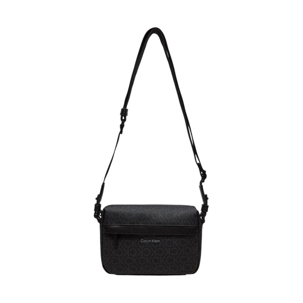 Front view with bag zipped and handles upright.