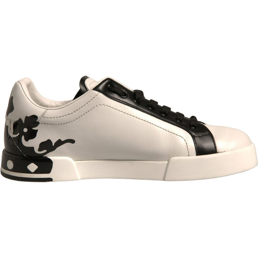 Dolce & Gabbana white black leather low-top sneakers with crown details, classic lacing, rubber sole, crafted in Italy.