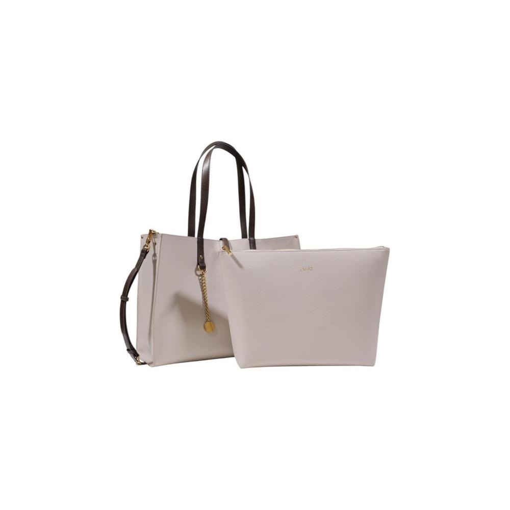 Front view with bag zipped and handles upright.